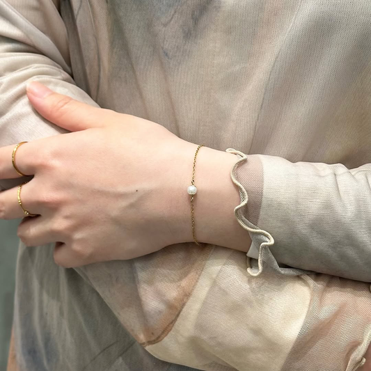 Single pearl styling